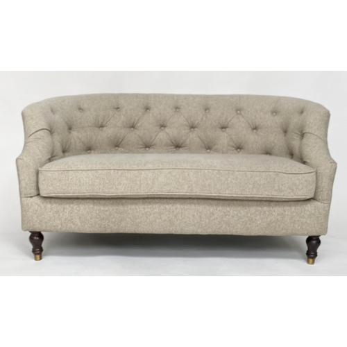 123 - SOFA, traditional design two seater, with textured grey upholstery, arched deep button upholstered b... 