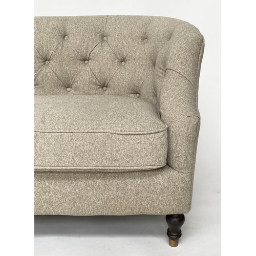 123 - SOFA, traditional design two seater, with textured grey upholstery, arched deep button upholstered b... 