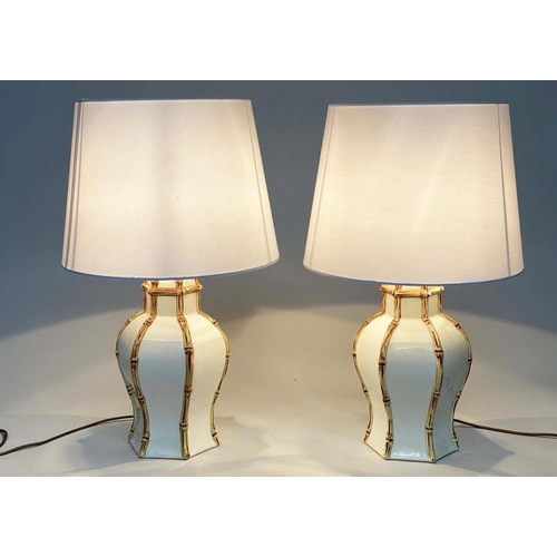 130 - TABLE LAMPS, a pair, ginger jar form, white ceramic with faux bamboo highlights (with shades, 70cm).... 