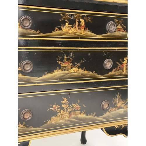 135 - BUREAU, 1930s black lacquered and gilt Chinoiserie decorated with filled interior and three long dra... 