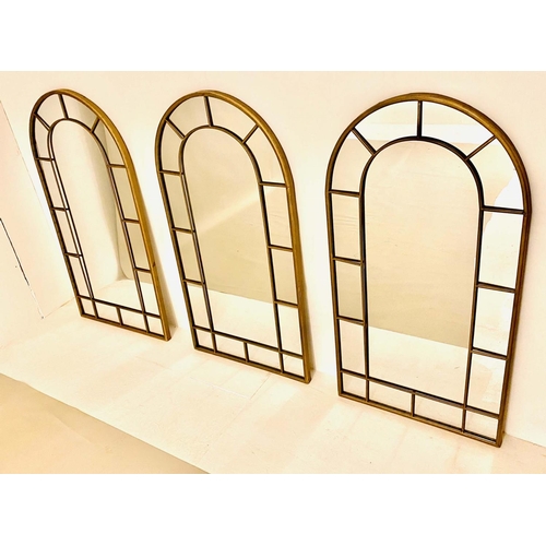 456 - ARCHITECTURAL WALL MIRRORS, a set of three, frames regency style, bronzed finish metal 107cm x 55cm.