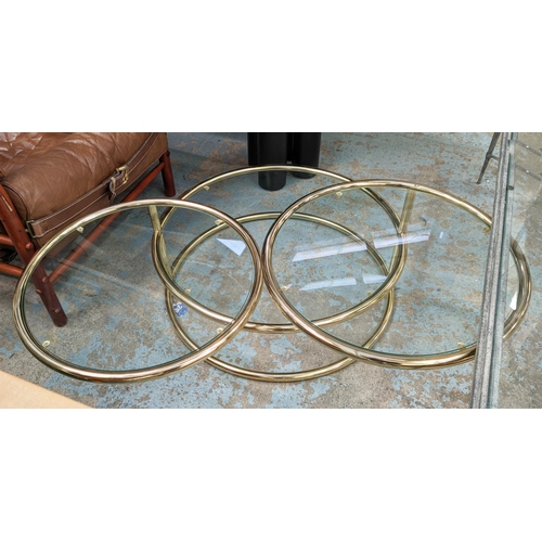 460 - AFTER MILO BAUGHMAN TABLE, 75cm x 50cm H, brass and glass tiered.