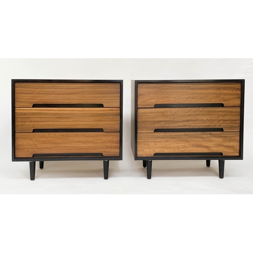 326 - STAG CHESTS, a pair, by John and Sylvia Reid, Afromonia teak and ebonised detail, each with three dr... 