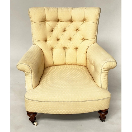 125 - ARMCHAIR, early Victorian walnut with deep button upholstered and cord bound primrose yellow upholst... 