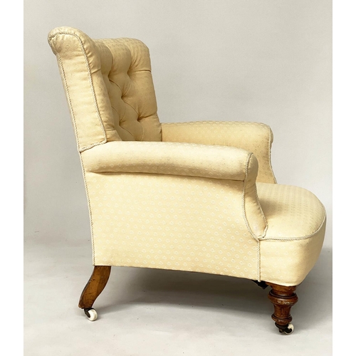 125 - ARMCHAIR, early Victorian walnut with deep button upholstered and cord bound primrose yellow upholst... 