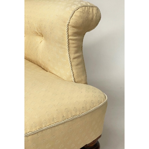 125 - ARMCHAIR, early Victorian walnut with deep button upholstered and cord bound primrose yellow upholst... 