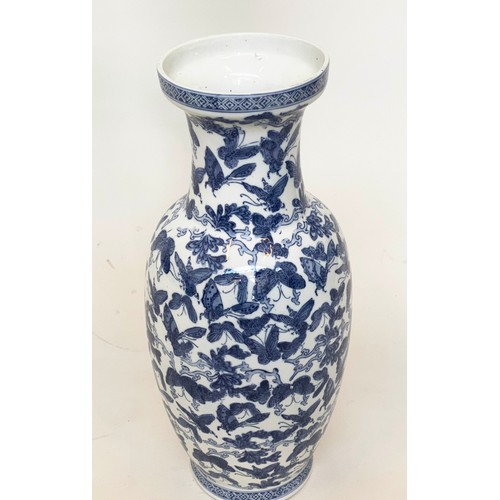 142 - BUTTERFLY VASE, Chinese blue and white ceramic with all over butterfly design, 52cm H.