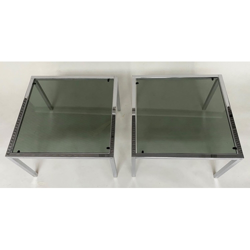 457 - MANNER OF MERROW ASSOCIATES SIDE TABLES, a pair, 1970s square chrome framed with sepia glass, 61cm x... 