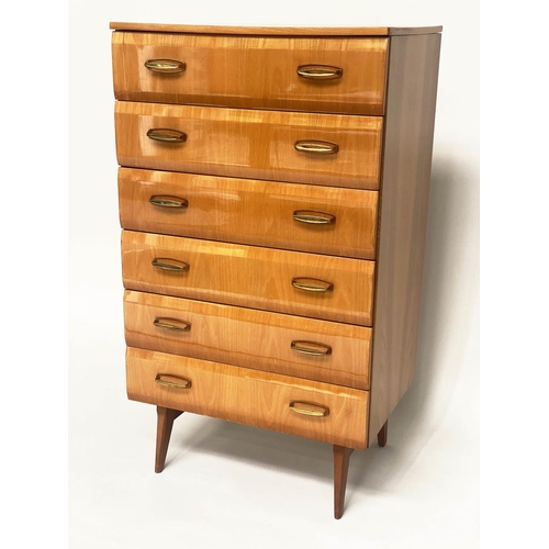 415 - MEREDEW TALL CHEST, 65cm x 48cm x 144cm, 1960s polished figured elm, with six shaped drawers and tap... 