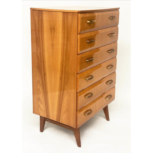 415 - MEREDEW TALL CHEST, 65cm x 48cm x 144cm, 1960s polished figured elm, with six shaped drawers and tap... 