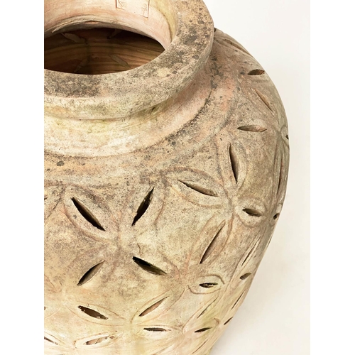 259 - OLIVE JAR, stamped weathered terracotta with crescent piercing throughout, 76cm H.