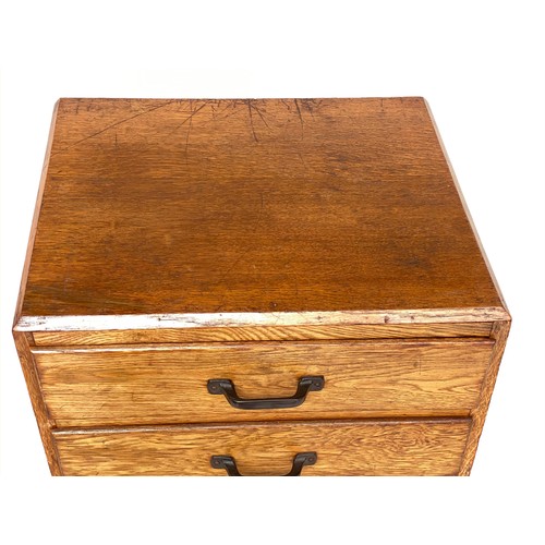 261 - BANK OF DRAWERS, early 20th century English oak with eight drawers, 48cm x 38cm x 105cm H.