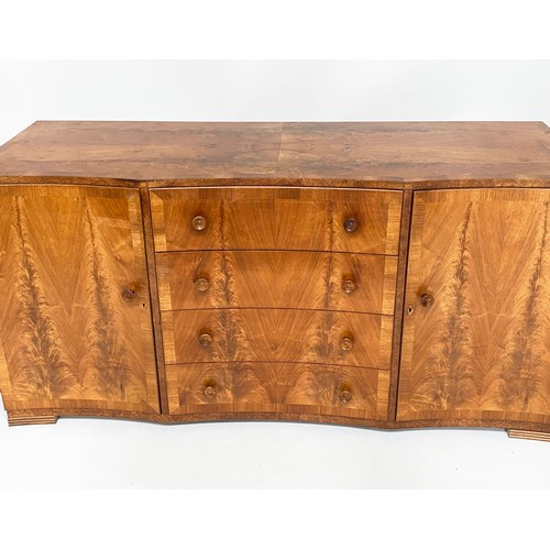 340 - SIDE CABINET, mid 20th century figured walnut with four concave drawers flanked by panelled doors, 1... 