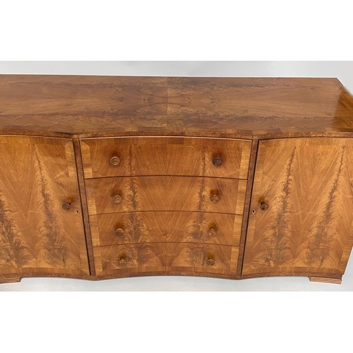 340 - SIDE CABINET, mid 20th century figured walnut with four concave drawers flanked by panelled doors, 1... 