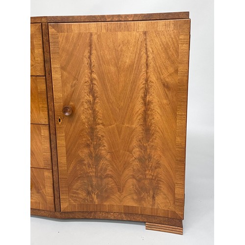 340 - SIDE CABINET, mid 20th century figured walnut with four concave drawers flanked by panelled doors, 1... 