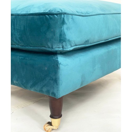 250 - ARMCHAIR, contemporary ocean blue velvet upholstery, with turned front supports and gilt metal casto... 