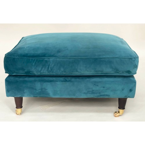 250 - ARMCHAIR, contemporary ocean blue velvet upholstery, with turned front supports and gilt metal casto... 