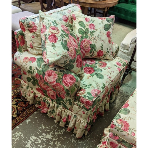 140 - ARMCHAIR, 96cm x 77cm H, floral chintz upholstery and footstool. (2)