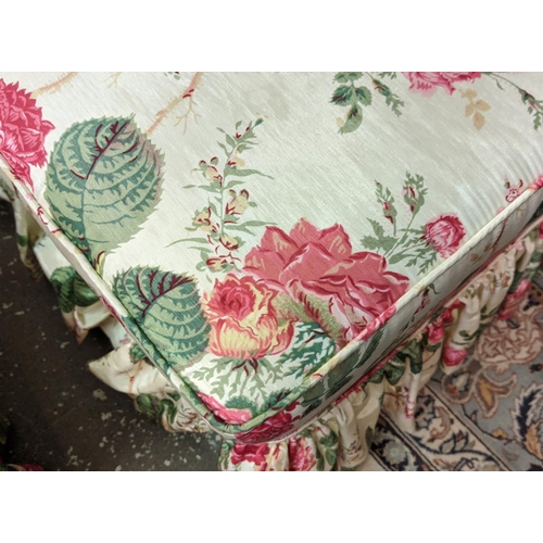 140 - ARMCHAIR, 96cm x 77cm H, floral chintz upholstery and footstool. (2)