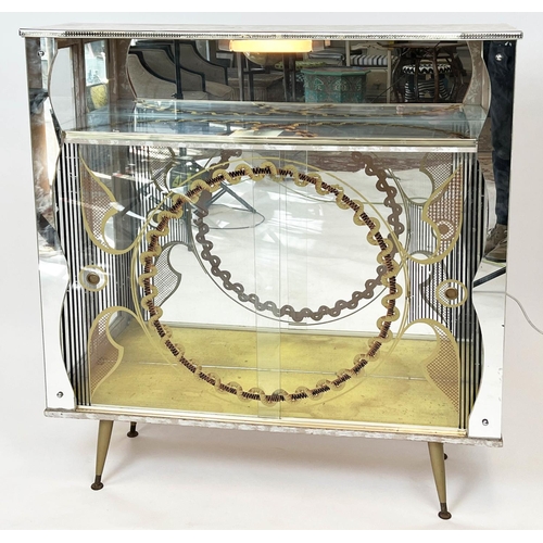 145 - COCKTAIL CABINET, circa 1950s, mirrored and etched glass with sliding doors and light up interior, 1... 