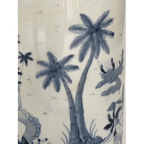 158 - STICK STAND, Chinese blue and white ceramic cylindrical with figures and palm trees, 45cm H.