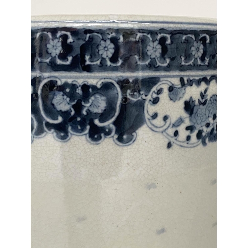 158 - STICK STAND, Chinese blue and white ceramic cylindrical with figures and palm trees, 45cm H.