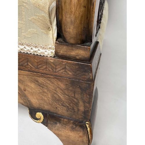 180 - BERGERES, a pair, early 20th century English walnut and gilt framed and cane panelled with silk broc... 