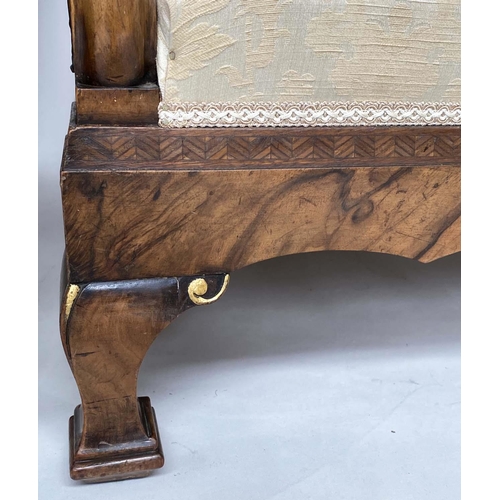 180 - BERGERES, a pair, early 20th century English walnut and gilt framed and cane panelled with silk broc... 