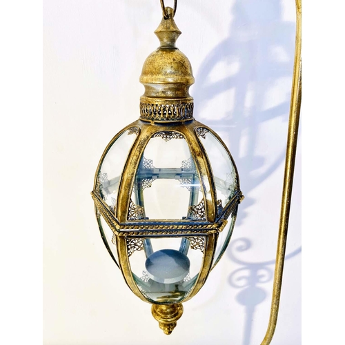 349 - LANTERNS ON STANDS, a pair, each 163cm high, 35cm across, in the Regency style, gilt metal frames (2... 