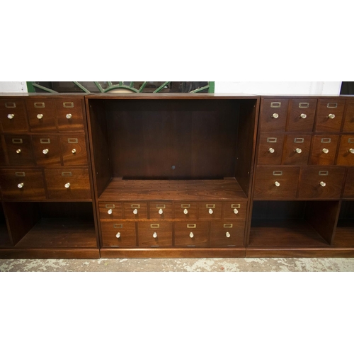 357 - MEDICINE CABINET, sapele in five parts containing twenty drawers with glass handles, adjustable shel... 