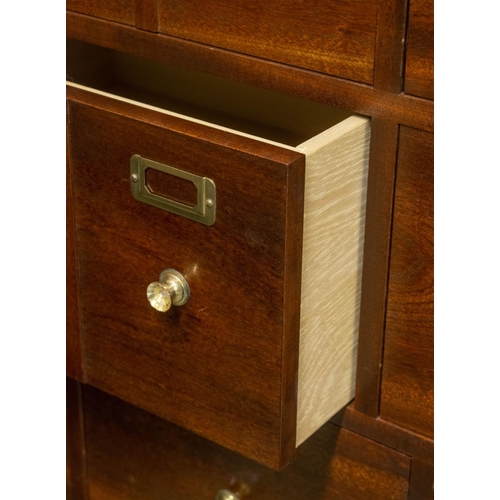 357 - MEDICINE CABINET, sapele in five parts containing twenty drawers with glass handles, adjustable shel... 