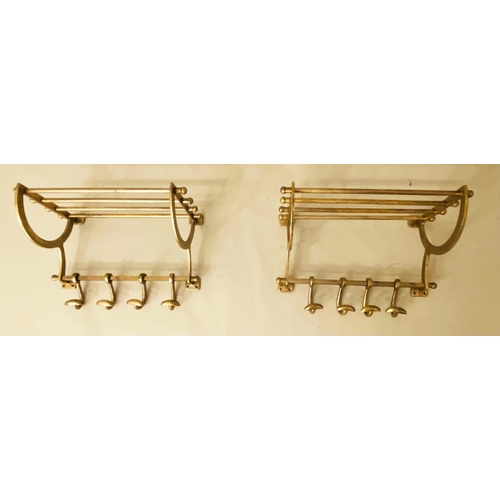 375 - WALL MOUNTING LUGGAGE RACKS, a pair, 35cm x 46cm x 27cm, gilt metal with run of coat hooks to the ba... 