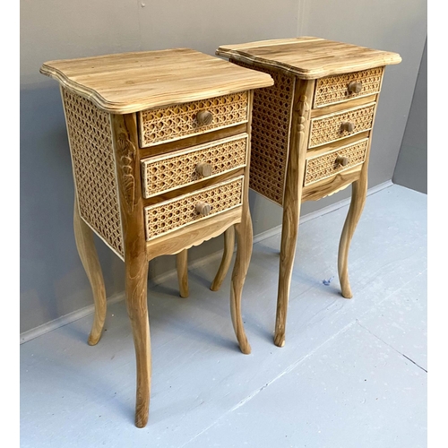 393 - BEDSIDE CHESTS, a pair, French style walnut with rattan detail, each with 3 drawers, 71cm x34cm x34c... 