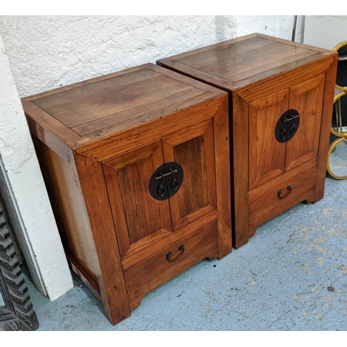 396 - THE NINE SCHOOLS LTD BEDSIDE CABINETS, a pair, Chinese Shanxi style elm, 57cm x 48cm x 72cm. (2)