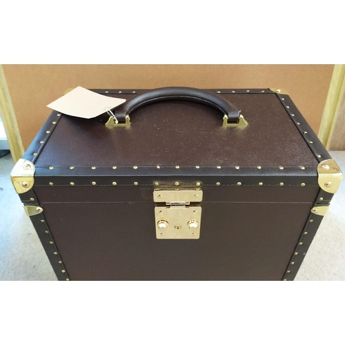 4 - TRAVELLING WHISKY CASE, brown leather with brass hardware, opening to reveal a fitted interior with ... 