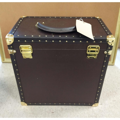 4 - TRAVELLING WHISKY CASE, brown leather with brass hardware, opening to reveal a fitted interior with ... 