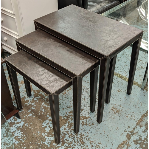 476 - NESTING TABLES, a set of three, leathered finish, 66cm x 40cm x 61cm at largest.