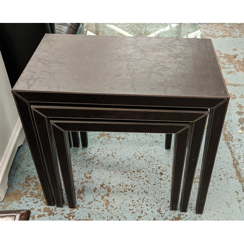 476 - NESTING TABLES, a set of three, leathered finish, 66cm x 40cm x 61cm at largest.