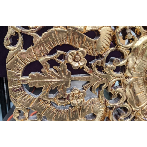 477 - DECORATIVE PANEL ON STAND, gilt finish, 60cm H.