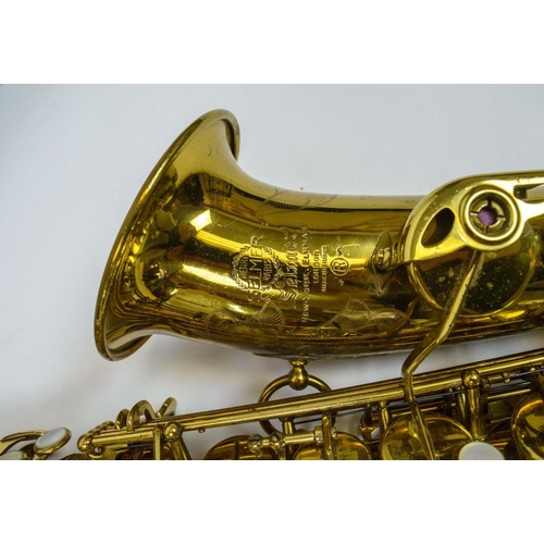 7 - HENRI SELMER BRASS SAXOPHONE, cased.