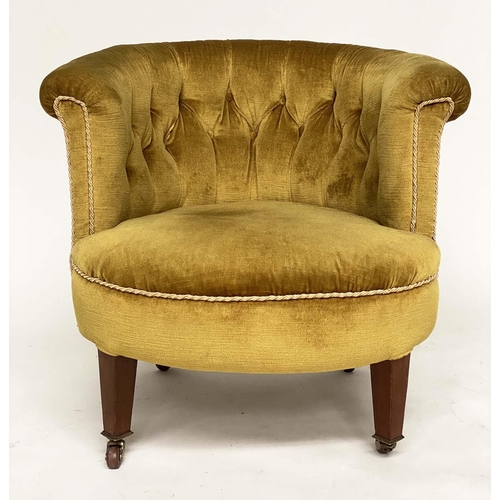 194 - ARMCHAIR, Edwardian mahogany with deep buttoned bow back, golden yellow velvet upholstered and taper... 