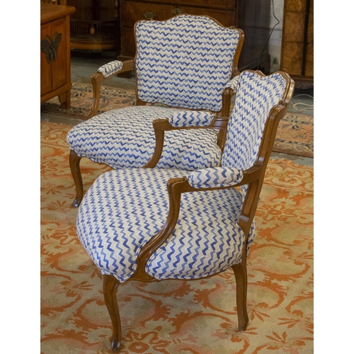 239 - FAUTEUILS, 76cm H x 65cm, a pair Louis XV style beechwood in blue chevron upholstery. (2)