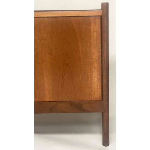 335 - VANSONS SIDE CABINET, 1960s teak with three drawers flanked by cupboards and stile supports, 183cm x... 