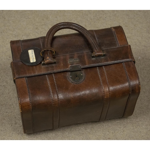 343 - ARIES LUGGAGE, a set of three, Spanish brown leather suitcases and a small holdall, largest 45cm x 6... 