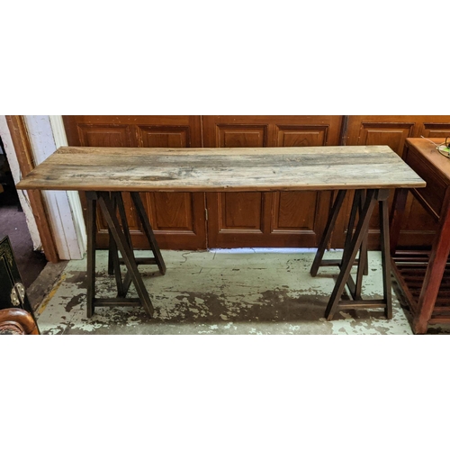 442 - CONSOLE TABLE, 50cm D x 175cm L x 82cm H, distressed wooden top, on two trestle bases.