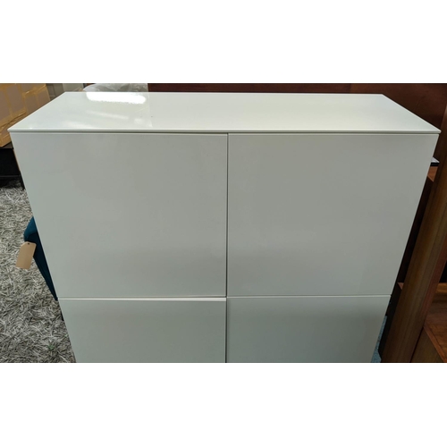 448 - NATUZZI CABINET, 124cm x 48cm x 128cm H, white lacquered finish.