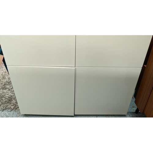 448 - NATUZZI CABINET, 124cm x 48cm x 128cm H, white lacquered finish.