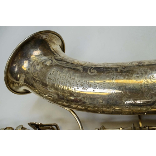 8 - COUESNON MONOPLOE SAXOPHONE SILVER PLATED, with inscription and case.