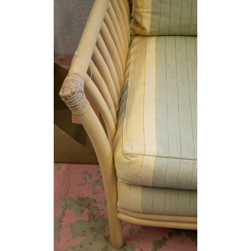 199 - CONSERVATORY RATTAN SOFA, yellow and green striped cushions, 90cm H x 42cm W.