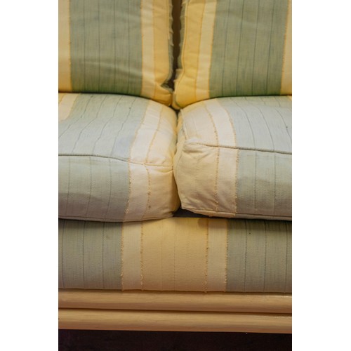 199 - CONSERVATORY RATTAN SOFA, yellow and green striped cushions, 90cm H x 42cm W.